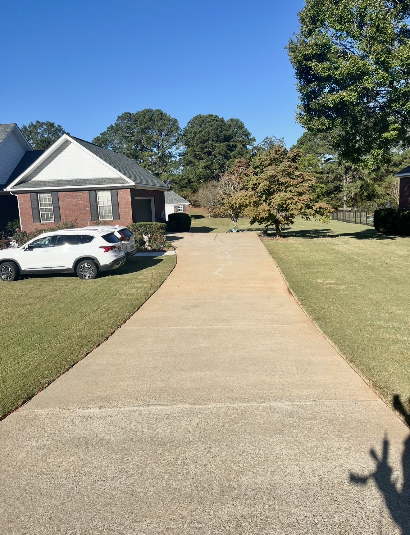 Driveway Pressure Washing to Remove Tiger Stripes in Opelika, Alabama Thumbnail